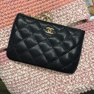 CHANEL Black Quilted Clutch with Gold Accents